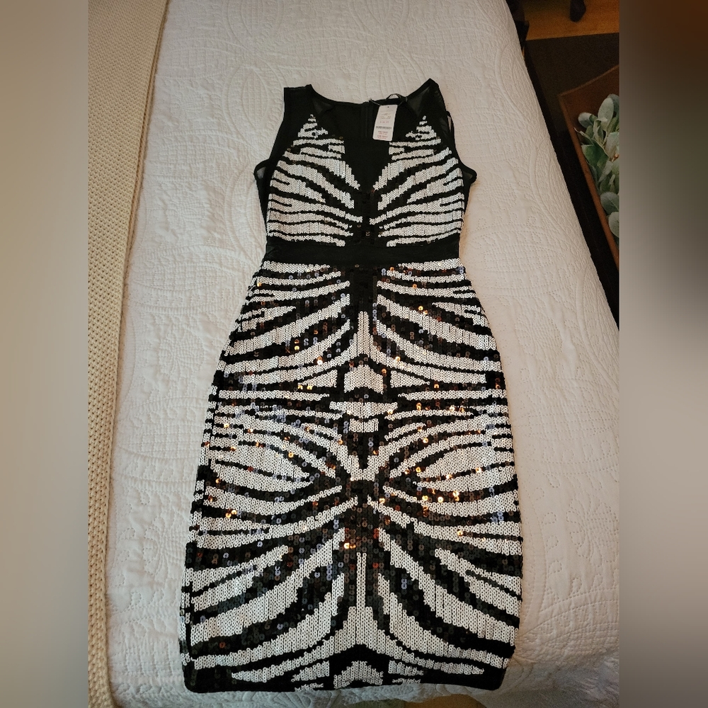 Bebe black and white sequins dress (fitted) with mesh center.